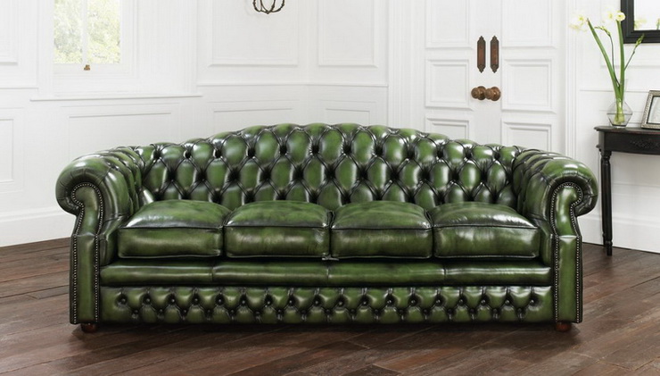 Зеленый кожаный диван